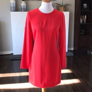 Red long sleeve dress with embroidery detail